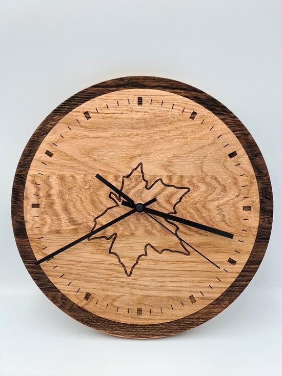 Handcrafted Oak wall clock with Engraved Maple Leaf: Unique Wooden Timepiece with Nature-Inspired Design